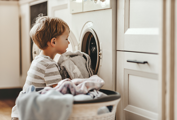 laundry basket and child